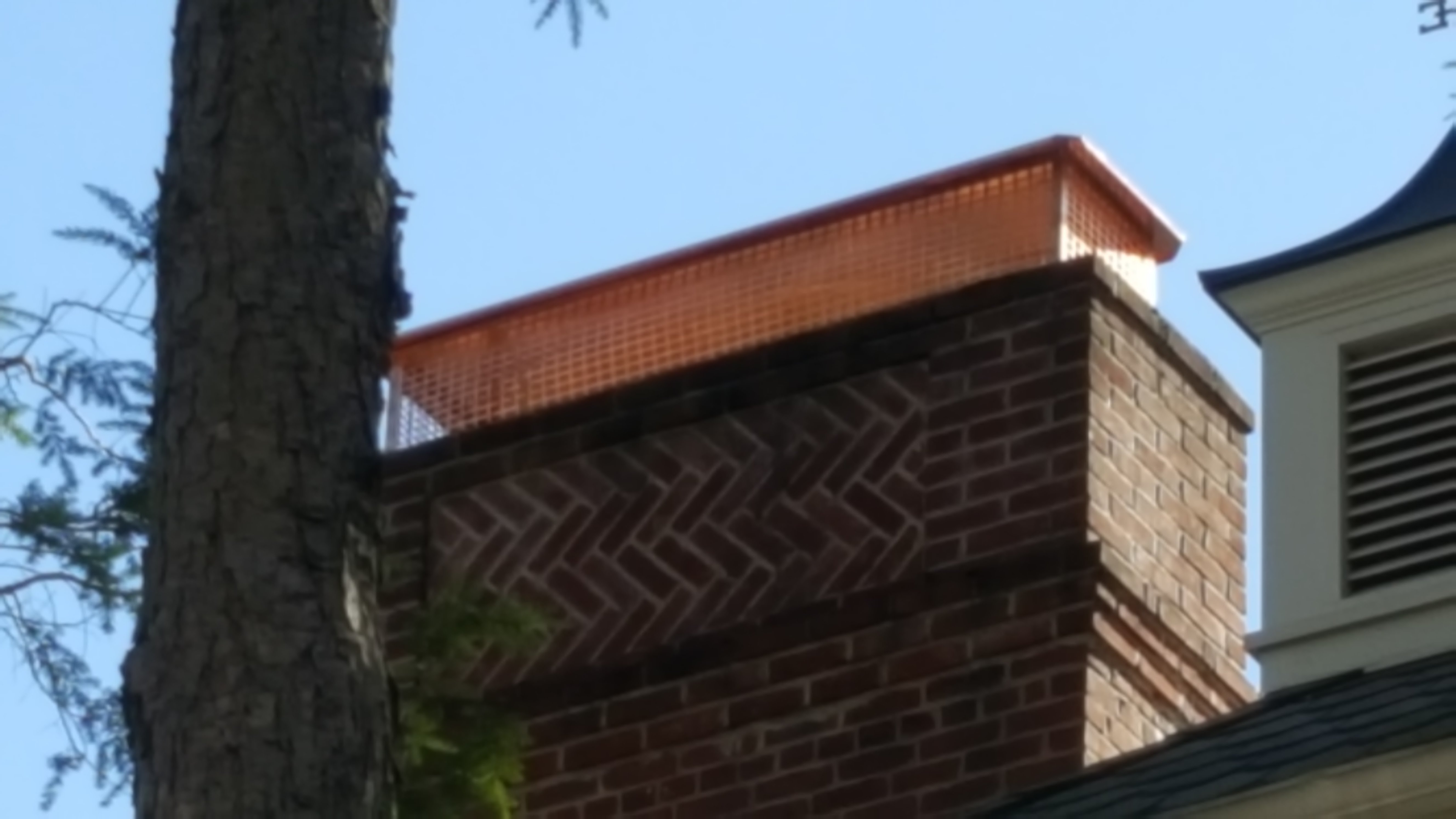 New stainless steel chimney cap installed in Freeport, NY