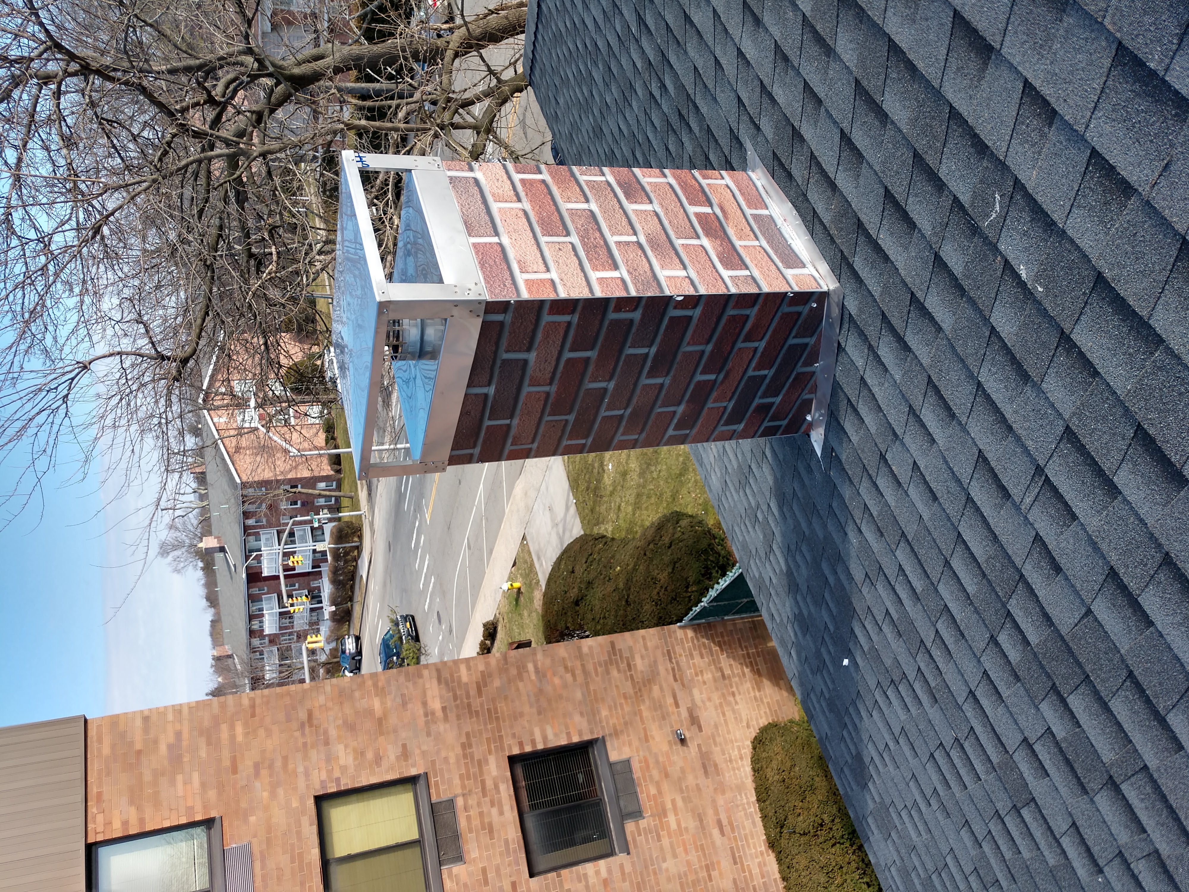 New elastomeric sealant applied to chimney crown in Freeport, NY
