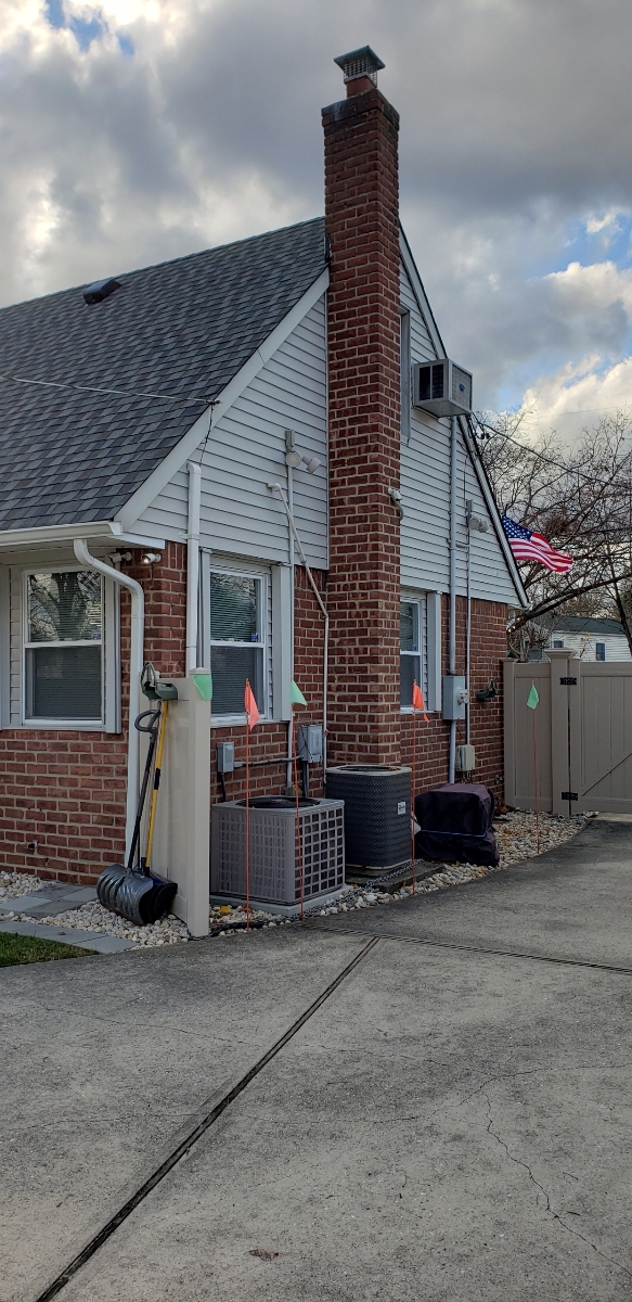 Professional chimney repointing restoring brick joints in Freeport, NY