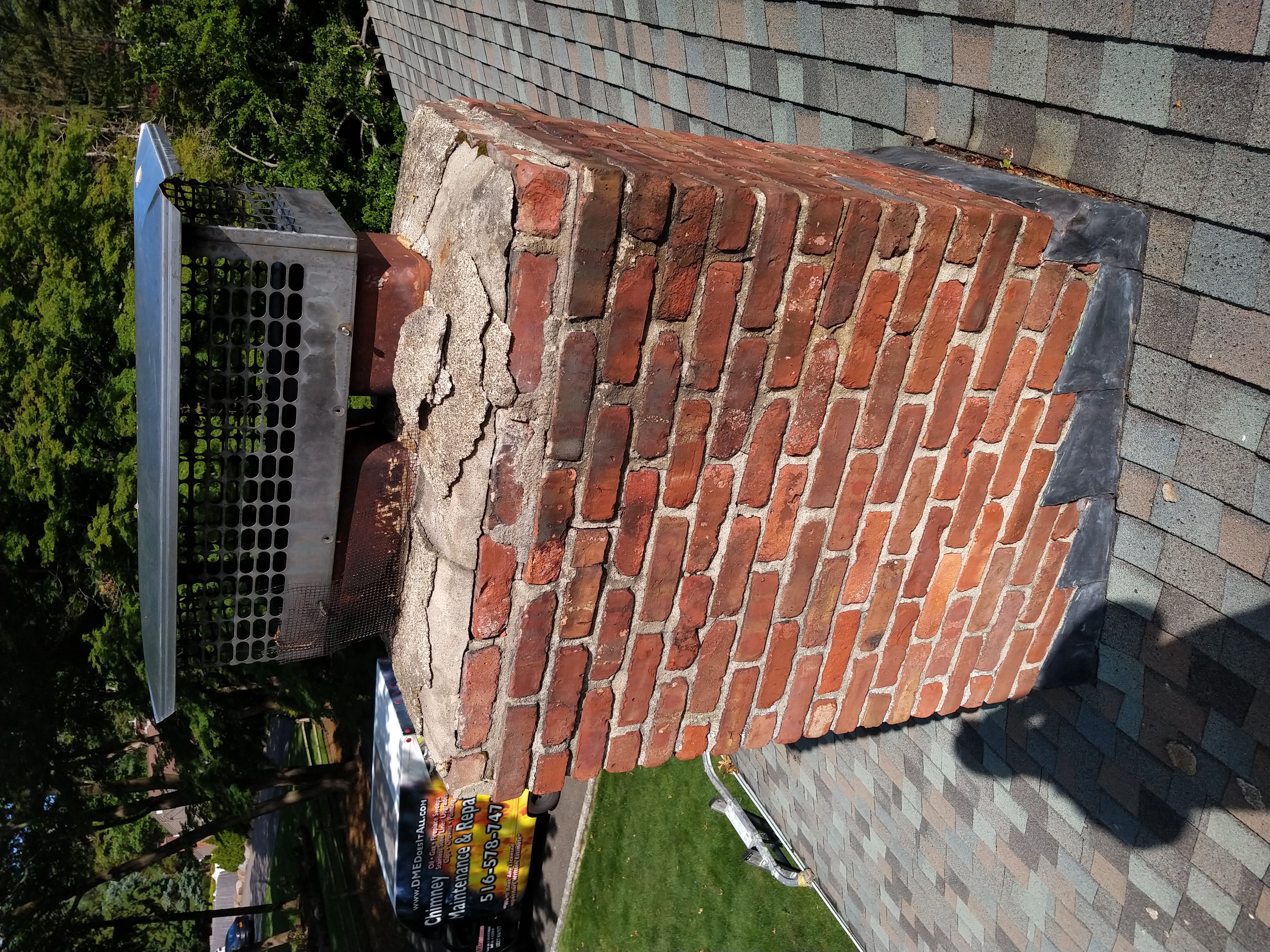Cracked chimney crown professionally repaired in Freeport, New York