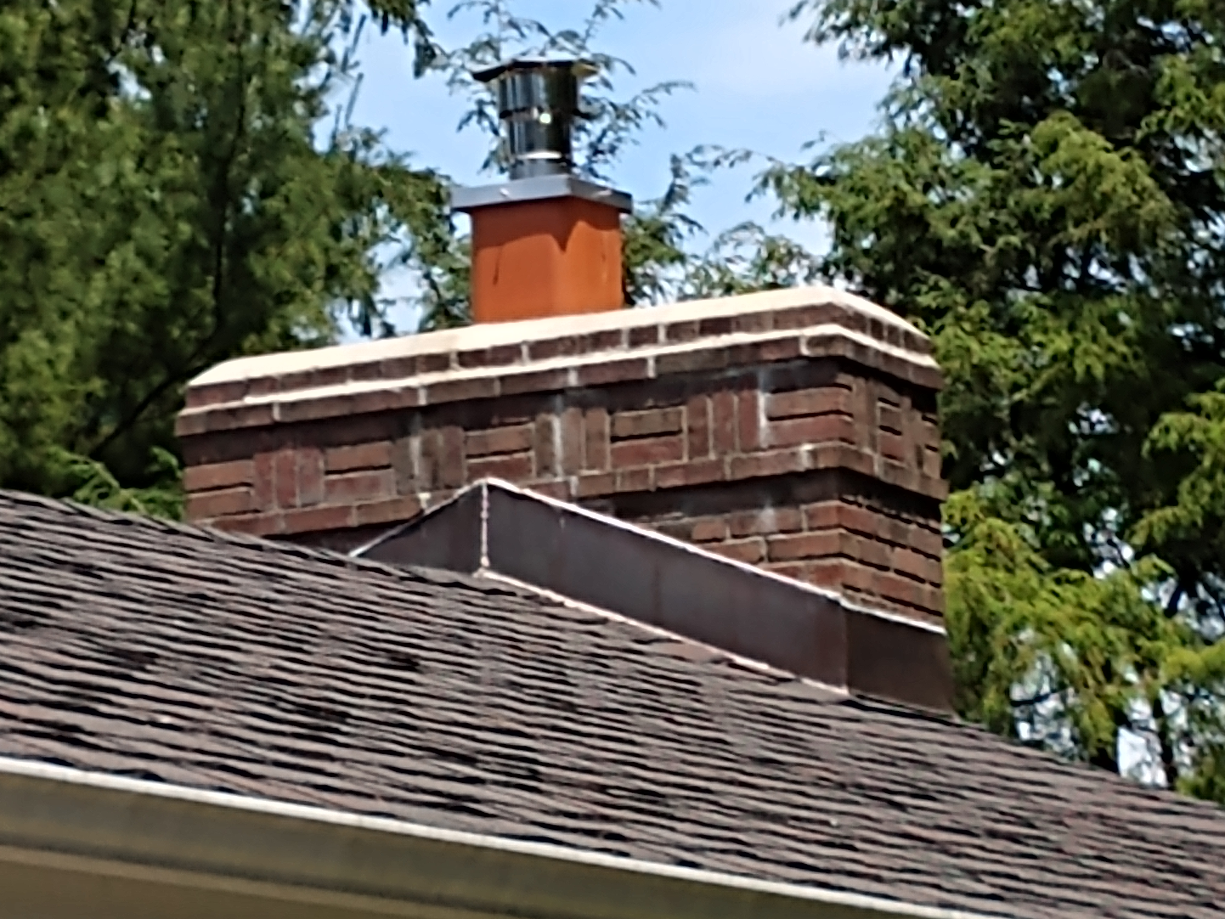 Stainless steel chimney cap with animal guard in Freeport, New York